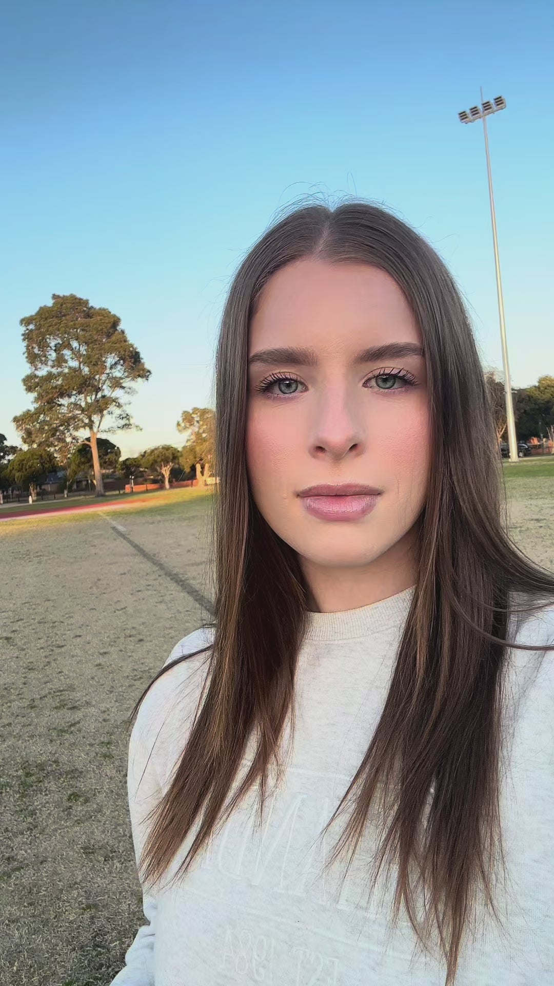 Load video: How to use Elevate 02 — woman outdoors demonstrating Elevate 95% Pure Australian Oxygen for wellness, recovery, and better breathing.